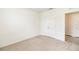 Bedroom featuring neutral carpet and closet with double doors at 715 Auburn Grove Ct, Auburndale, FL 33823
