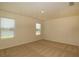 Bright bedroom features neutral carpet, blinds and natural light at 715 Auburn Grove Ct, Auburndale, FL 33823