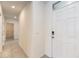 Entryway featuring light tile floors and a white painted door at 715 Auburn Grove Ct, Auburndale, FL 33823