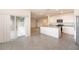 Open kitchen and great room concept featuring stainless steel appliances and tile floors at 715 Auburn Grove Ct, Auburndale, FL 33823