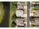 Desirable property with mature trees on a picturesque lot near a tranquil lake, offering serene views at 7263 Winding Lake Cir, Oviedo, FL 32765