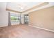 Spacious main bedroom with a ceiling fan, neutral carpeting and private lanai access at 7263 Winding Lake Cir, Oviedo, FL 32765