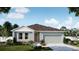 Charming single-story home with a two-car garage, neutral color palette, and well-manicured landscaping at 742 Ginger Dr, Haines City, FL 33844