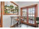 Breakfast nook features a bistro table, stools, and sliding glass doors to the outside at 8554 Amber Oak Dr, Orlando, FL 32817