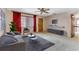 Cozy living room featuring neutral tones, modern furnishings, and a ceiling fan at 944 Essex Rd, Daytona Beach, FL 32117