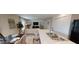 Open-concept kitchen and living area, perfect for entertaining and Gathering gatherings at 103 Orchid Ct, Poinciana, FL 34759