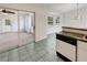 Open concept kitchen with tiled floor adjacent to dining and living area at 10350 Sw 62Nd Terrace Rd, Ocala, FL 34476