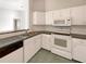 Efficient kitchen features modern appliances and ample counter space for easy meal preparation at 10350 Sw 62Nd Terrace Rd, Ocala, FL 34476