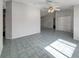 Bright living room with tiled floor and ceiling fan at 10350 Sw 62Nd Terrace Rd, Ocala, FL 34476