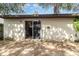 This backyard has a concrete area and a sliding glass door at 109 Long Leaf Pine Cir, Sanford, FL 32773