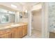 Ensuite bathroom featuring tile flooring, vanity, and walk-in shower at 109 Long Leaf Pine Cir, Sanford, FL 32773
