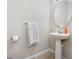 Powder room with pedestal sink and tile flooring at 11213 Grander Dr, Windermere, FL 34786