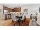 Dining area featuring a table with six chairs and updated kitchen in the background at 11213 Grander Dr, Windermere, FL 34786