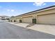 Attached garages with tidy landscaping along a paved driveway enhance curb appeal at 11213 Grander Dr, Windermere, FL 34786