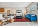Bright living room with tile floors, comfortable seating, and stylish decor at 11213 Grander Dr, Windermere, FL 34786