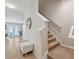 Staircase features carpeted steps and a white banister at 11213 Grander Dr, Windermere, FL 34786