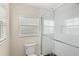 Updated bathroom with a glass shower and tiled accents at 11225 Cypress Trail Dr, Orlando, FL 32825