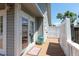 Wooden deck featuring french doors, white railings, and a light grey house exterior at 1308 S Pennsylvania Ave # 3, Winter Park, FL 32789