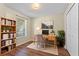 Office space with a built in bookcase and a window for natural light at 13146 Odyssey Lake Way, Orlando, FL 32826