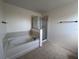 Bright bathroom featuring a tub-shower combo with tiled accents and neutral-toned walls at 1325 Bella Coola Dr, Orlando, FL 32828