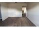 Neutral bedroom features brown carpet and an open doorway with white trim at 1325 Bella Coola Dr, Orlando, FL 32828