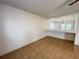 Living room featuring an open floor plan, tile floors, and stairs to the second floor at 1325 Bella Coola Dr, Orlando, FL 32828