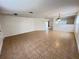 Spacious living room with tile flooring and open layout, connecting to other rooms at 1325 Bella Coola Dr, Orlando, FL 32828