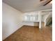Living room featuring an open floor plan, tile floors, and stairs to the second floor at 1325 Bella Coola Dr, Orlando, FL 32828