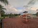 Inviting community playground with a variety of play structures for children at 1325 Bella Coola Dr, Orlando, FL 32828