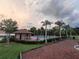 Resort style pool with seating areas and lush tropical landscaping at 1325 Bella Coola Dr, Orlando, FL 32828