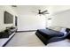 Bedroom featuring black trim and minimalist furniture at 13851 Rushing Creek Run, Orlando, FL 32824