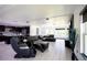 Spacious and modern kitchen with stainless steel appliances and seamless flow into a luxury living area at 13851 Rushing Creek Run, Orlando, FL 32824