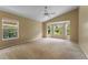 The bedroom features a bay window, vaulted ceiling, and carpeting at 14780 Hartford Run Dr, Orlando, FL 32828