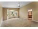 Spacious bedroom with a bay window offering plenty of natural light and a view to the outdoors at 14780 Hartford Run Dr, Orlando, FL 32828
