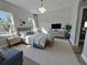 Bright bedroom with large windows, stylish furniture, and a calming color palette at 16494 Sw 54Th Court Rd, Ocala, FL 34473