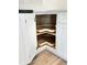 Kitchen cabinet featuring two lazy-susan-style rotating shelves at 16494 Sw 54Th Court Rd, Ocala, FL 34473