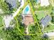 Aerial view of property boundaries showcasing a private residence with a large pool and well-maintained landscaping at 1905 Old Club Pt, Maitland, FL 32751