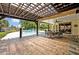 Inviting backyard pool and patio area with an outdoor dining space at 1905 Old Club Pt, Maitland, FL 32751