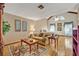 Bright bedroom with vaulted ceilings, hardwood floors, and a comfortable seating area for relaxation at 1905 Old Club Pt, Maitland, FL 32751