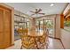 Breakfast nook with backyard view and sliding glass doors to patio at 1905 Old Club Pt, Maitland, FL 32751