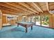 Spacious game room with a pool table and natural wood accents, ideal for recreation and leisure at 1905 Old Club Pt, Maitland, FL 32751
