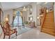 Bright living room with vaulted ceiling, natural light, and staircase at 1905 Old Club Pt, Maitland, FL 32751