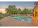 Inviting backyard pool area with lush landscaping and an expansive patio perfect for entertaining at 1905 Old Club Pt, Maitland, FL 32751