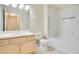 Well-lit bathroom featuring a tub and shower combination and a vanity sink at 1979 Summer Club Dr # 111, Oviedo, FL 32765
