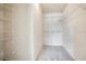 A walk-in closet providing functional storage with installed shelving at 1979 Summer Club Dr # 111, Oviedo, FL 32765