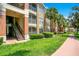 The exterior of the building with well-maintained landscaping at 1979 Summer Club Dr # 111, Oviedo, FL 32765