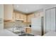 Bright kitchen featuring modern appliances and ample cabinet space at 1979 Summer Club Dr # 111, Oviedo, FL 32765