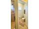 Clean bathroom featuring a shower, toilet, neutral walls, and a small window at 206 Yellow Snapdragon Dr, Davenport, FL 33837