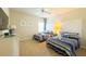 Comfortable bedroom features twin beds, closet, and nautical decor at 206 Yellow Snapdragon Dr, Davenport, FL 33837