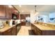 Spacious kitchen with modern appliances and tiled backsplash, great for cooking and entertaining at 206 Yellow Snapdragon Dr, Davenport, FL 33837